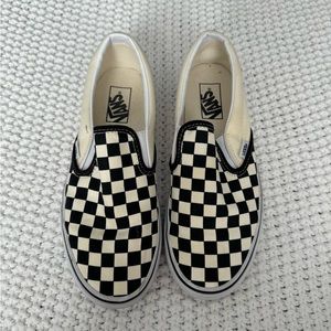 Checkered slip on vans
